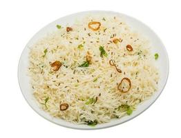 Cumin rice on the plate and white background photo