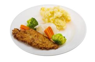 schnitzel on the plate and white background photo