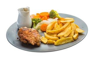 Cordon bleu on the plate and white background photo