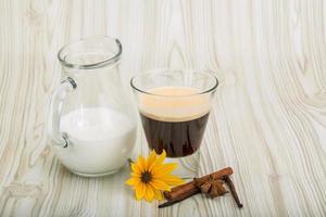 Espresso on wooden background photo