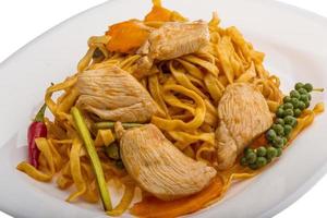 Fried noodles with chicken photo