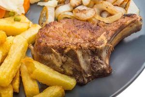 T-bone steak on the plate  close up view photo