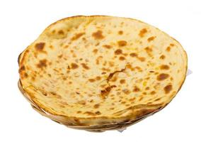 Alu Naan in a basket on white background photo