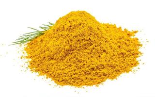 Curry powder on white background photo