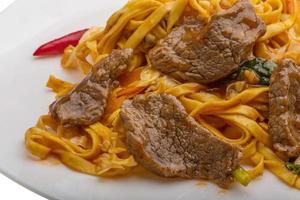 Fried noodles with beef photo