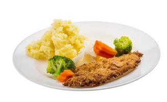 schnitzel on the plate and white background photo