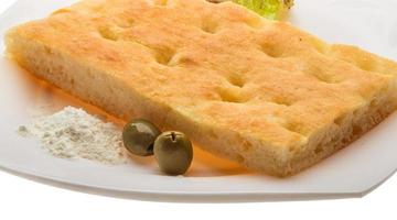 Olive bread on the plate photo