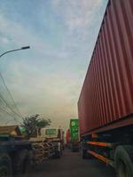 West Java, Indonesia on July 2022. Vehicles running on the Jakarta Toll Road photo
