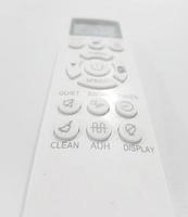 West Java, Indonesia on July 2022. A white air conditioner remote on a white background. photo