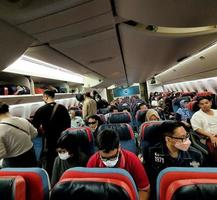 Istanbul, Turkey on July 2022. Situation from the cabin of a Turkish Airlines economy class plane where the seat consists of three parts, right, left and center. photo