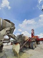 This is a process of casting concrete using a concrete pump to reach casting locations that are far away. photo