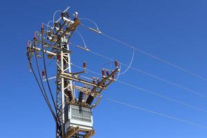 Electrical wires carrying high voltage current. photo