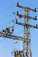 Electrical wires carrying high voltage current. photo