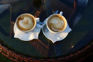 Hot coffee on the table in a restaurant. photo