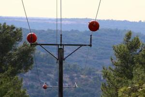 Electrical wires carrying high voltage current. photo