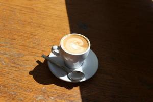 Hot coffee on the table in a restaurant. photo