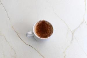 Hot coffee on the table in a restaurant. photo