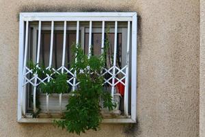 Haifa Israel May 19, 2019. Small window on the facade of a residential building. photo