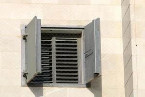 Haifa Israel May 19, 2019. Small window on the facade of a residential building. photo