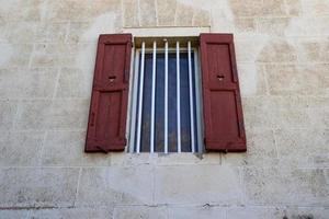 Haifa Israel May 19, 2019. Small window on the facade of a residential building. photo