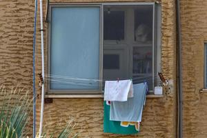 Haifa Israel May 19, 2019. Small window on the facade of a residential building. photo