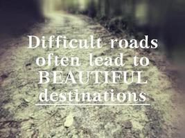 Difficult roads often lead to beautiful destinations. Inspirational quote concept. photo