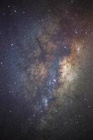 Close up of Milky way galaxy with stars and space dust in the universe, Long exposure photograph, with grain. photo