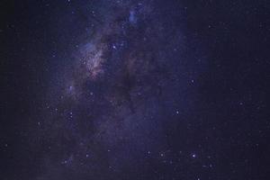 Starry night sky and milky way galaxy with stars and space dust in the universe photo