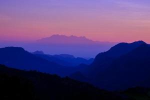 Beautiful mountain landscape at sunset at Monson viewpoint Doi AngKhang, Chaingmai Thailand photo