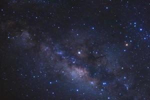 Milky way galaxy with stars and space dust in the universe, Long exposure photograph, with grain. photo