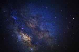 Starry night sky and milky way galaxy with stars and space dust in the universe photo