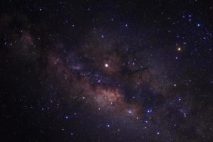 Milky way galaxy with stars and space dust in the universe, Long exposure photograph, with grain. photo