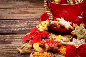 Knar and christmas food sweet cookies on wooden table background. Copy space. Selective focus. Happy new year concept. photo