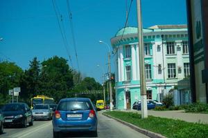 Kerch, Crimea - July 31, 2022 Urban landscape with streets and transport. photo