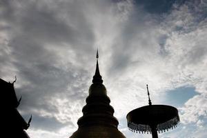 thai temple at sunset photo