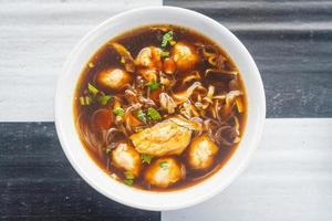 a bowl of meatballs premium photo