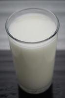 a glass of white milk premium photo