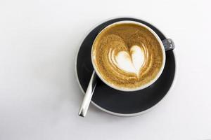 Cup of coffee on a table photo