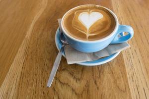 Cup of coffee on a table photo