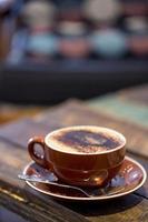 Cup of coffee on a table photo