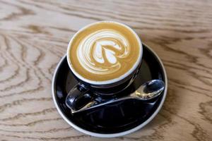 Cup of coffee on a table photo