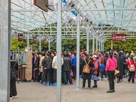 zhangjiajie.China - 14 October 2018. Unacquainted People waiting For Bus to Bailong Glass elevator and Cable Car in Zhangjiajie National Forest Park in Wulingyuan District Zhangjiajie City China. photo