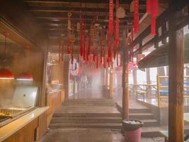 zhangjiajie.China - 14 October 2018.Red ribbon hang on the ceiling in tianzi mountain Zhangjiajie National Forest Park in Wulingyuan District Zhangjiajie City China in the Foggy day. photo
