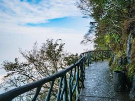 Stone Walkway balcony on the Tianmen mountain cilff with beautiful White cloud and sky at zhangjiajie city China.Tianmen mountain the travel destination of Hunan zhangjiajie city China photo