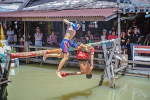 chonburi.Thailand - June 17 2017.Unacquainted Thai Water boxing in Pattaya Floating Market.Chonburi Thailand Travel.Pattaya Floating Market is the Famous Floating Market near Pattaya photo