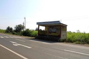 Vijayapura, Karnataka, November 26, 2021 - Village Bus Stop on National Highway 218. photo