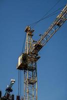 yellow tower crane photo