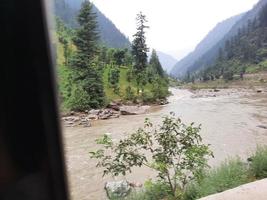 Kashmir is the most beautiful region in the world which is famous for its green valleys, beautiful trees, high mountains and flowing springs. photo