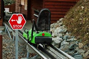 Electric sleigh ride on rails. Stop hand sign. photo