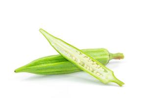 Fresh Green Okra and slide isolated on white background with clipping path photo